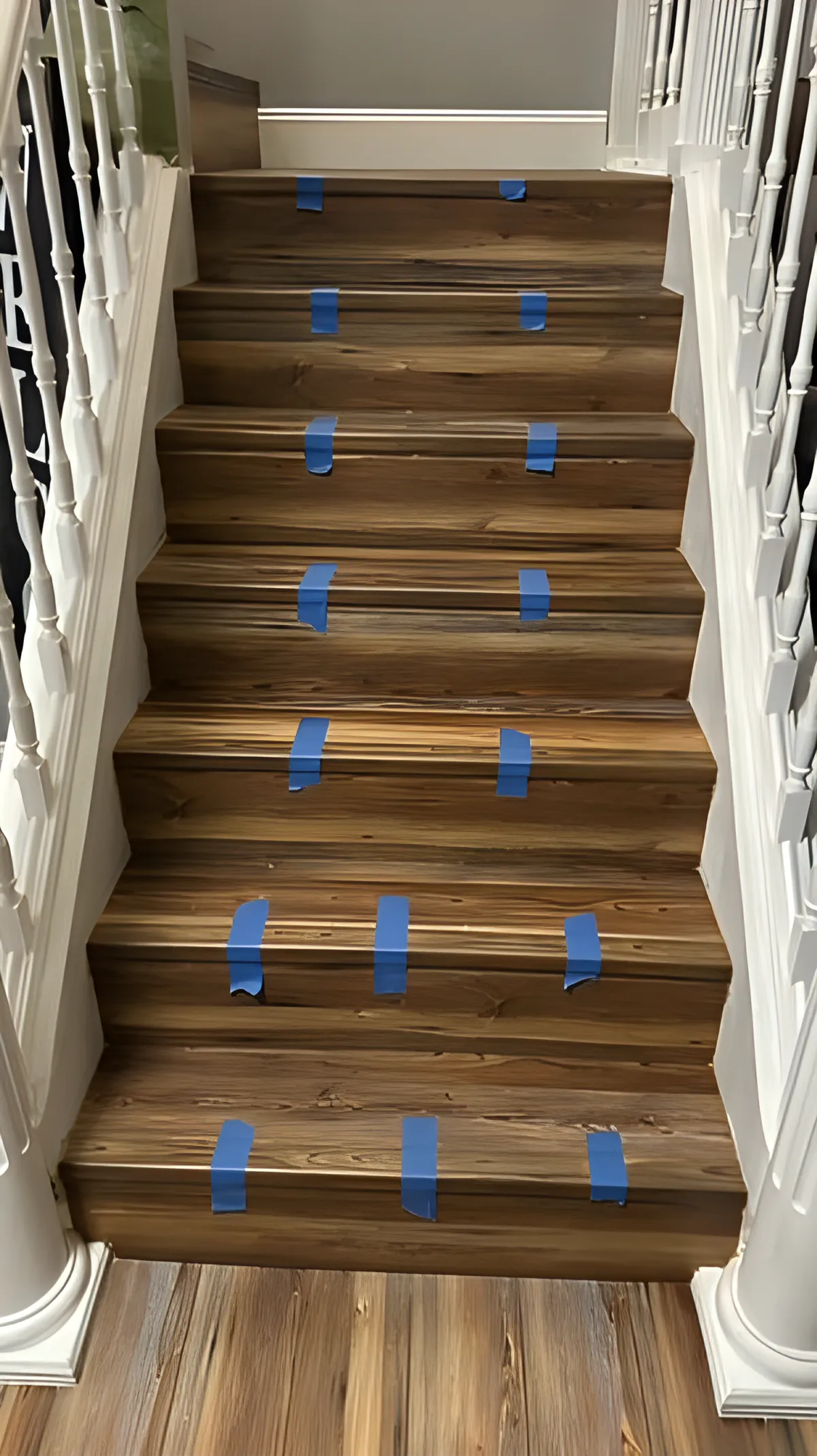 New stair treads secured and curing before finishing