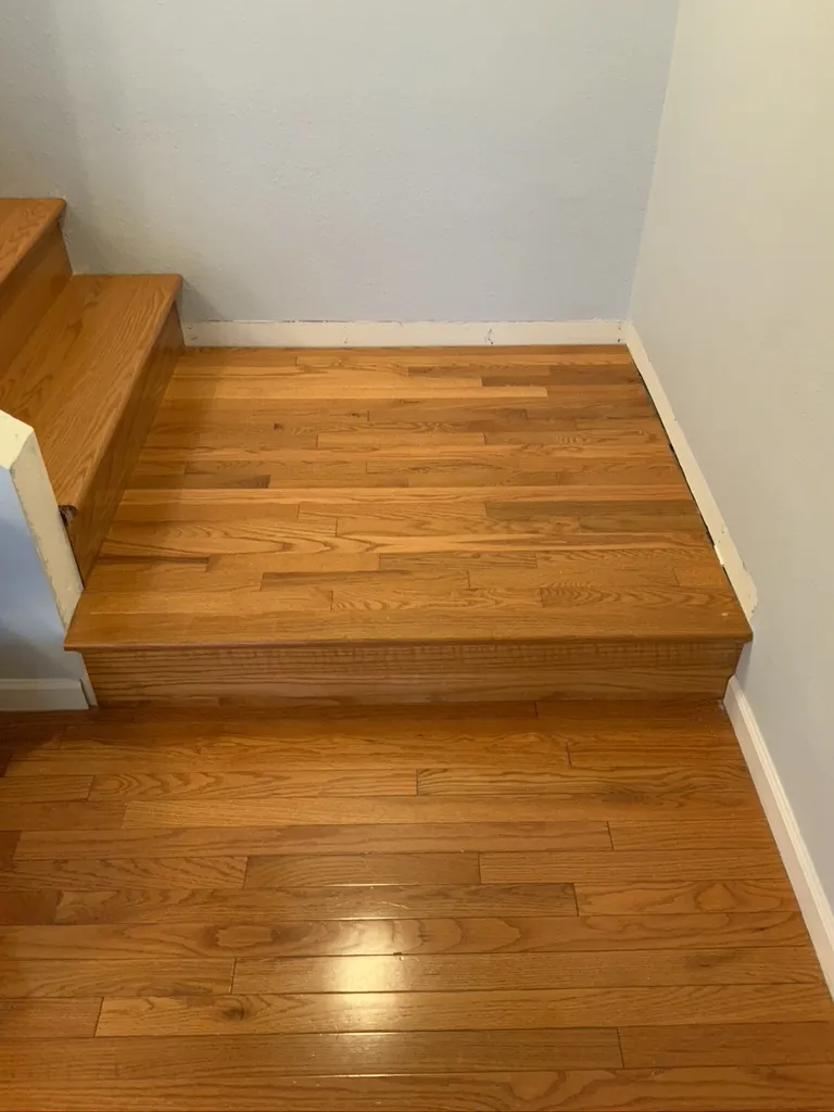 Solid oak hardwood flooring and stair landing detail