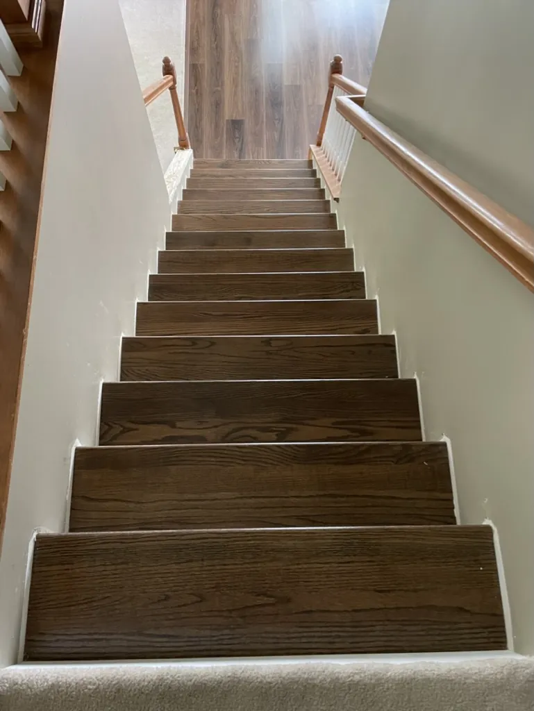 Dark stained stair treads with white risers